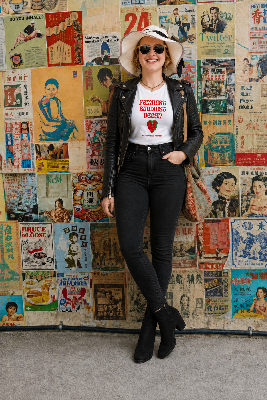 Model wearing Feminist Buddhist Vegan t-shirt with black leather jacket